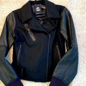 NWOT Nike motojacket with leather sleeves size xs. New condition never worn.